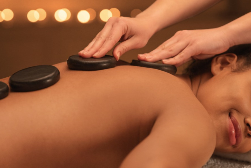 Click Big Deals - Melt Away TENSION with a Deep Tissue  Massage with Hot Stones from Graceful Touch Massage! A $105 value ONLY $52.50!