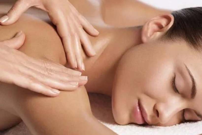 Melt Away TENSION with a Deep Tissue Massage with Hot Stones from Graceful Touch Massage! A $105 value ONLY $52.50!